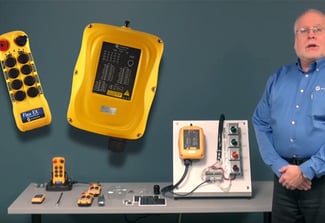 Image of Man with Radio Controls on table next to him