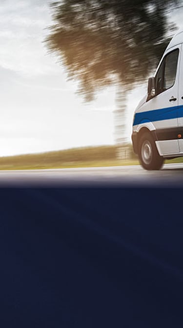 Image of Pfaff-silberblau van driving down the road