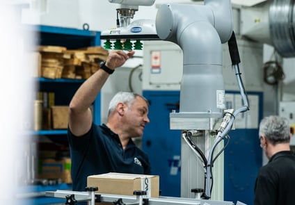 Robotic lifting column designed to raise and position heavy components with precise, automated vertical motion.