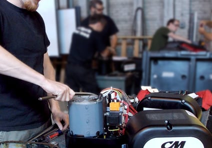 Image of man working on CM System