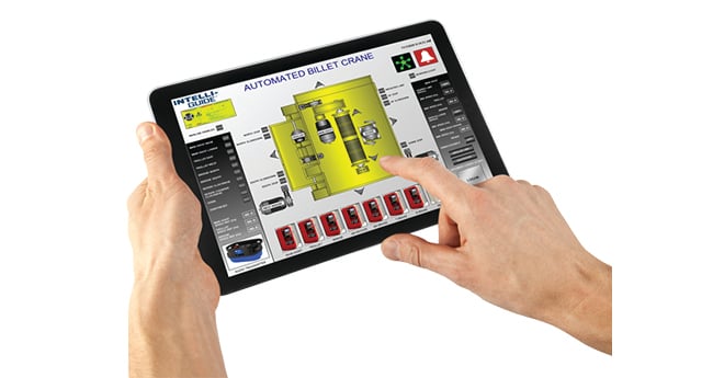 Image of someone holding an iPad with Intelli Guide "Automated Billet Crane" on screen