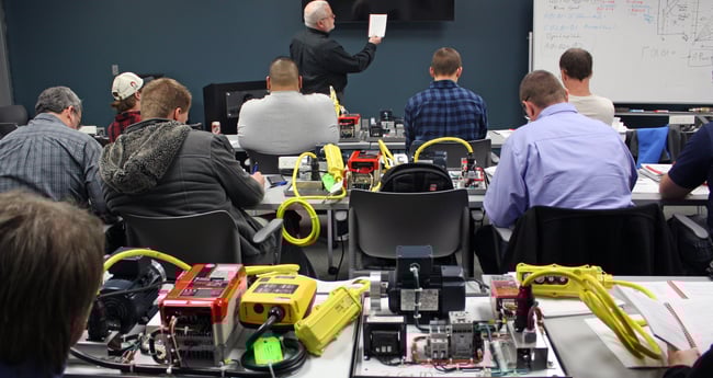 Image of Man leading IMPULSE AC Drive Training in Classroom