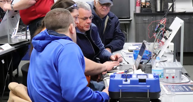 Image of a group of people working on Overhead Crane Training