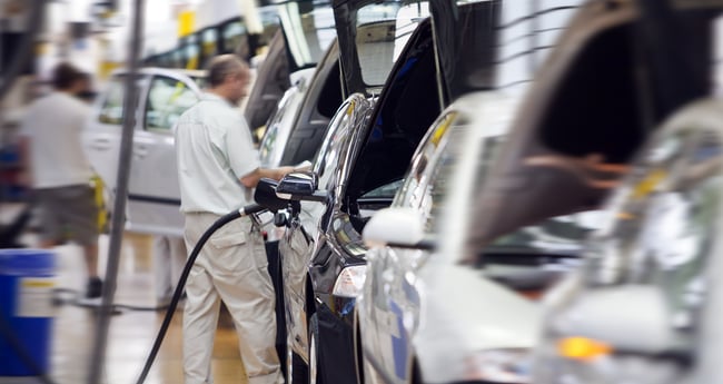 Image of Man working on Car