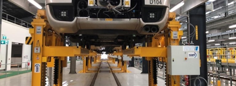 Image of Bus on Lifting System