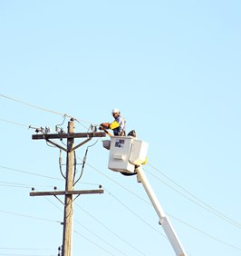Electric Line Worker on Pole